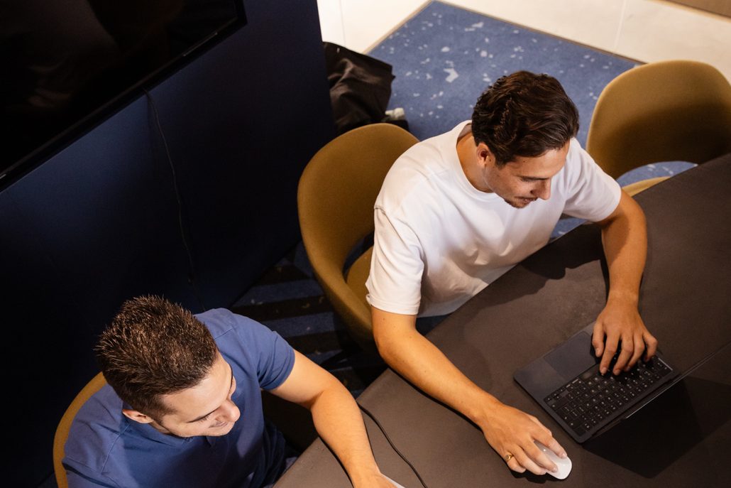 Looking at the numbers together on a laptop